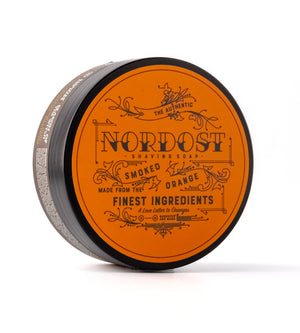 a round container with black and orange label